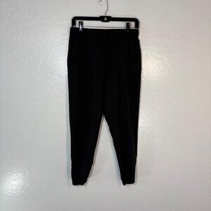 Albion Pants Womens Small Black Nylon Spandex Joggers Athletic Zip Ankles Logo